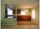 Eat-in kitchen offers a breakfast bar, ample counterspace and wood cabinetry at 6339 Pontiac Ln, North Port, FL 34287