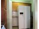 Kitchen with a side-by-side refrigerator and granite countertops at 6339 Pontiac Ln, North Port, FL 34287