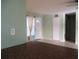 Inviting living room featuring neutral paint, tile floors, and natural light near entry at 6339 Pontiac Ln, North Port, FL 34287
