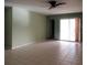 Bright living room with sliding glass doors to the outdoor patio brings in natural light at 6339 Pontiac Ln, North Port, FL 34287