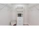 Well-organized walk-in closet with built-in shelving and ample storage space at 6618 Grand Estuary Trl # 101, Bradenton, FL 34212