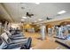 A well-equipped gym features cardio machines, weightlifting equipment, and ceiling fans at 6618 Grand Estuary Trl # 101, Bradenton, FL 34212