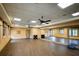 A mirrored studio space featuring wood floors and ample natural light at 6618 Grand Estuary Trl # 101, Bradenton, FL 34212