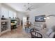Relaxing living room with comfortable seating, built-in shelving, and lots of natural light at 7031 Scrub Jay Dr, Sarasota, FL 34241