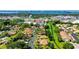Overhead view of a peaceful residential area with tidy streets, green spaces, and convenient access to local amenities at 7142 Bright Creek Dr # 35, Sarasota, FL 34231