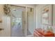 Inviting foyer with view to front porch, artwork, chest and decorative accents at 7142 Bright Creek Dr # 35, Sarasota, FL 34231