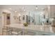 Bright, spacious kitchen with white cabinets, modern countertops, and stylish pendant lighting at 7142 Bright Creek Dr # 35, Sarasota, FL 34231
