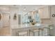 Bright kitchen featuring white cabinets, stainless steel appliances, and counter seating at 7142 Bright Creek Dr # 35, Sarasota, FL 34231