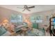 Comfortable living room with a large window and beachy décor, creating a serene and inviting space at 7142 Bright Creek Dr # 35, Sarasota, FL 34231