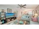 Comfortable living room with ceiling fan, stylish decor, and view into the kitchen at 7142 Bright Creek Dr # 35, Sarasota, FL 34231