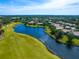 Breathtaking aerial view of the community, showcasing the golf course, lake, and beautiful homes at 7229 Lake Forest Gln, Lakewood Ranch, FL 34202