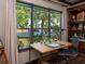Bright office with large window, allowing for stunning views of the lake at 7229 Lake Forest Gln, Lakewood Ranch, FL 34202