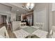 Cozy dining area adjacent to a modern kitchen with stainless steel appliances at 7705 Grand Estuary Trl # 206, Bradenton, FL 34212