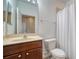 Bathroom with vanity and shower at 7983 Limestone Ln # 14-201, Sarasota, FL 34233