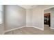 Bedroom with hardwood floors near kitchen at 7983 Limestone Ln # 14-201, Sarasota, FL 34233