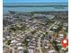 Panoramic aerial view of a coastal community with beautiful waterfront access and tropical surroundings at 8225 Drew St, Englewood, FL 34224