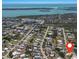 Community aerial view showcasing proximity to pristine beaches and sparkling ocean waters at 8225 Drew St, Englewood, FL 34224