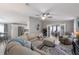 Open-concept living room flowing into a dining area and adjoining office space at 8225 Drew St, Englewood, FL 34224