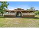 Exterior view of horse barn with covered stalls at 8280 Ibis St, Sarasota, FL 34241