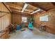 Wood-paneled room filled with equestrian supplies, offering ample storage space in a rustic setting at 8280 Ibis St, Sarasota, FL 34241