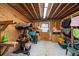 This tack room has wooden walls and is well-equipped with saddle racks and storage for all of your equestrian needs at 8280 Ibis St, Sarasota, FL 34241