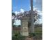 The Enclave at River Strand community entrance sign with lush landscaping at 9011 Hammock Edge Pl, Bradenton, FL 34212