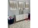 Cozy living space featuring modern decor and a stylish white geometric sideboard at 9011 Hammock Edge Pl, Bradenton, FL 34212