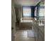 Relaxing main bathroom with a soaking tub, separate shower, and dual vanity at 9011 Hammock Edge Pl, Bradenton, FL 34212