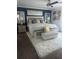 Beautifully decorated main bedroom featuring a large bed, stylish furnishings, and modern decor at 9011 Hammock Edge Pl, Bradenton, FL 34212