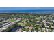Aerial view showcasing lake views and the community's well-maintained landscaping, and scenery at 9238 13Th Avenue Nw Cir, Bradenton, FL 34209