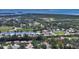 Overhead view of a neighborhood on the water with scenic ocean views in the distance at 9238 13Th Avenue Nw Cir, Bradenton, FL 34209