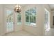 Screened in patio with views of the pool and tropical landscaping at 9238 13Th Avenue Nw Cir, Bradenton, FL 34209