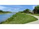 Scenic Legacy Trail view alongside a tranquil river, perfect for biking and recreation at 8711 Palmer Park Cir, Sarasota, FL 34238