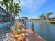 Colorful chairs overlooking the canal at 10016 Spoonbill E Rd, Bradenton, FL 34209
