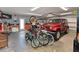 Spacious garage with ample storage, vehicle, and recreational equipment; ideal for hobbyists and collectors at 10016 Spoonbill E Rd, Bradenton, FL 34209