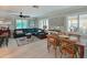 Comfortable living room with wood floors and windows with plantation shutters at 10016 Spoonbill E Rd, Bradenton, FL 34209