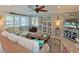 Bright and airy living room with coastal decor, creating a relaxing and inviting atmosphere at 10016 Spoonbill E Rd, Bradenton, FL 34209