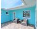 Outdoor patio seating offers the perfect spot for relaxing and enjoying the coastal breezes at 10016 Spoonbill E Rd, Bradenton, FL 34209