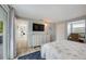 This bedroom features a comfortable bed, dresser, closet, and study, creating a functional and inviting space at 104 29Th St # 3, Holmes Beach, FL 34217