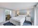 This bright bedroom offers a comfortable bed, a built-in desk, and ample storage for a relaxing stay at 104 29Th St # 3, Holmes Beach, FL 34217