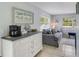 Cozy living room featuring neutral tones, comfortable seating, and lots of natural light at 104 29Th St # 3, Holmes Beach, FL 34217