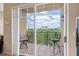 Private balcony with seating offers relaxing views of the surrounding area at 1064 N Tamiami Trl # 1425, Sarasota, FL 34236