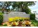 Beautiful entrance sign to Marie Selby Botanical Gardens surrounded by tropical plants and lush greenery at 1064 N Tamiami Trl # 1425, Sarasota, FL 34236