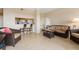 Cozy living room featuring comfortable wicker furniture, a modern coffee table, and neutral tones at 1064 N Tamiami Trl # 1425, Sarasota, FL 34236