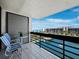 Beautiful balcony view showing the pristine waterway, blue skies, and other residential buildings at 1095 Gulf Of Mexico Dr # 503, Longboat Key, FL 34228