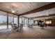 Bright lounge area with comfortable seating, ceiling fans, and large windows offering pleasant views at 1095 Gulf Of Mexico Dr # 503, Longboat Key, FL 34228