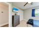 Relaxing bedroom featuring TV, dark dresser and closet with ample storage space at 1103 134Th E St, Bradenton, FL 34212