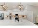 Modern kitchen with white cabinets, stainless appliances, and an open layout at 1103 134Th E St, Bradenton, FL 34212