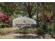Welcoming 'Adventure Park' community sign surrounded by lush greenery and mature trees, creating a warm and inviting entrance at 12005 Summer Meadow Dr, Lakewood Ranch, FL 34202