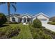 Attractive home with a well-maintained lawn and lush landscaping at 12005 Summer Meadow Dr, Lakewood Ranch, FL 34202
